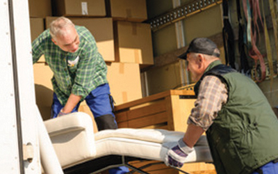 two Sunrise Atlanta movers loading truck